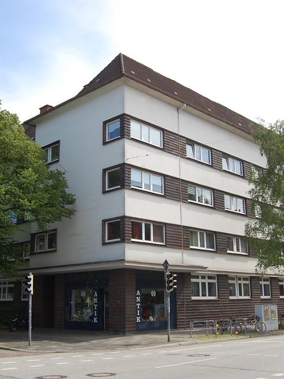 Clinker used on the ground floor and around the windows of an otherwise minimal stucco facade